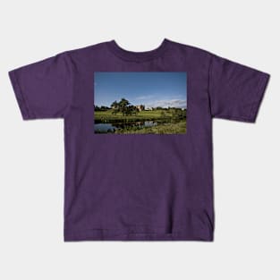 Alnwick Castle reflected in the River Aln Kids T-Shirt